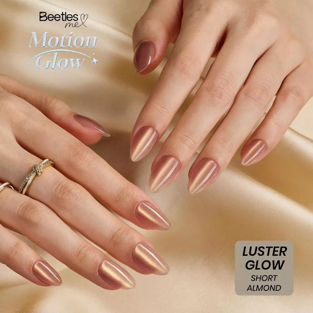 Beetles Motion Luster Glow short almond press on nails close up
