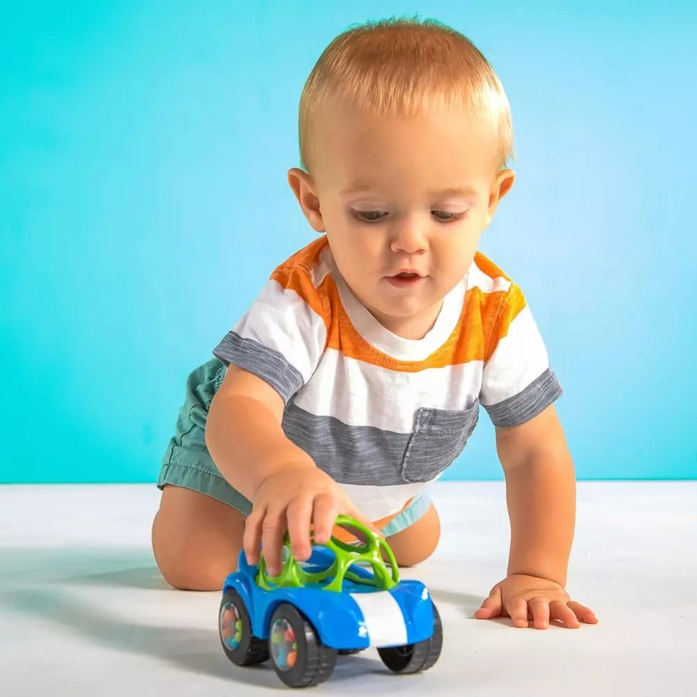 Bright Starts Oball Rattle and Roll Push Car Toy used by baby during crawling play