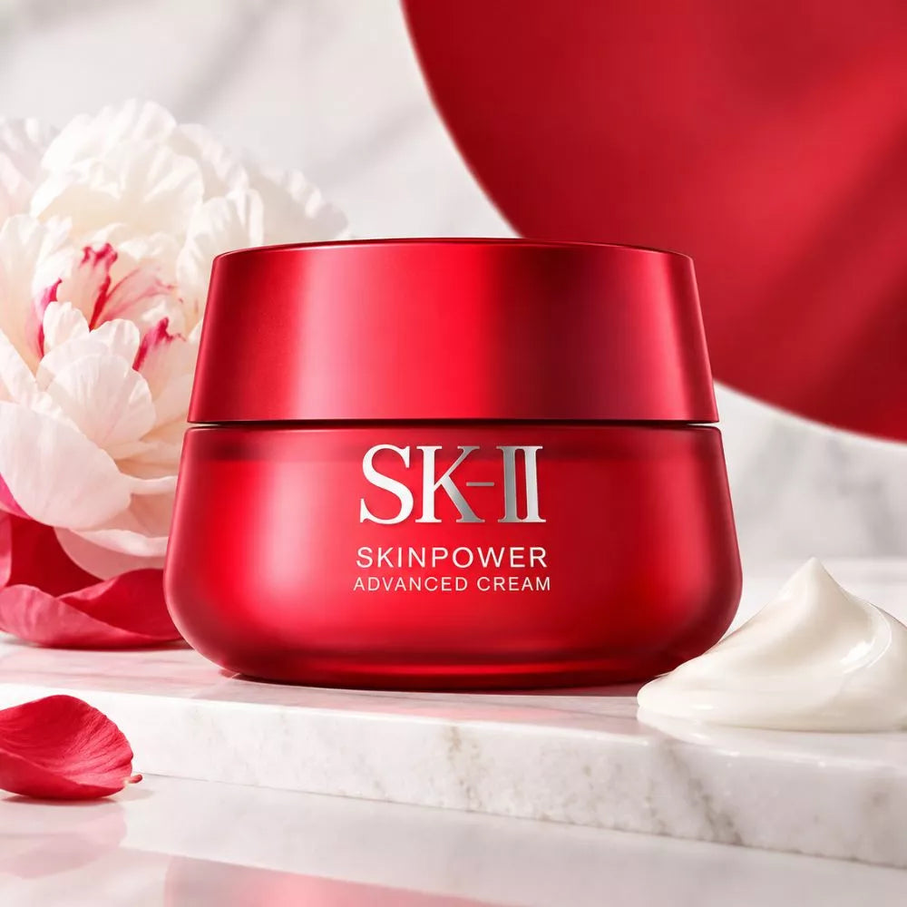 SK-II Skinpower Advanced Cream 80g red jar with floral skincare background